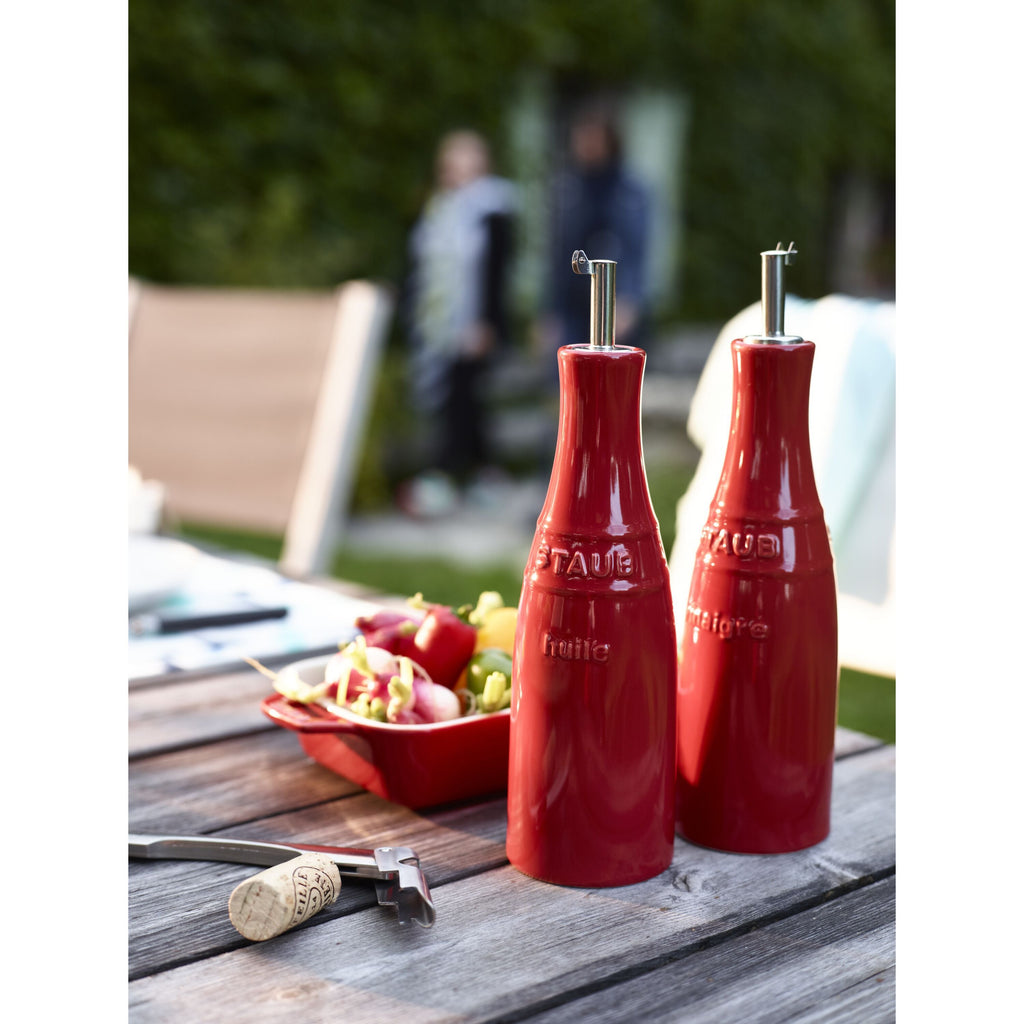 Cherry red STAUB ceramic oil and vinegar set with precision pouring spouts and protective caps — view 3