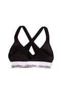 White women's v-neck bralette with crossover straps and contrasting elastic logo band