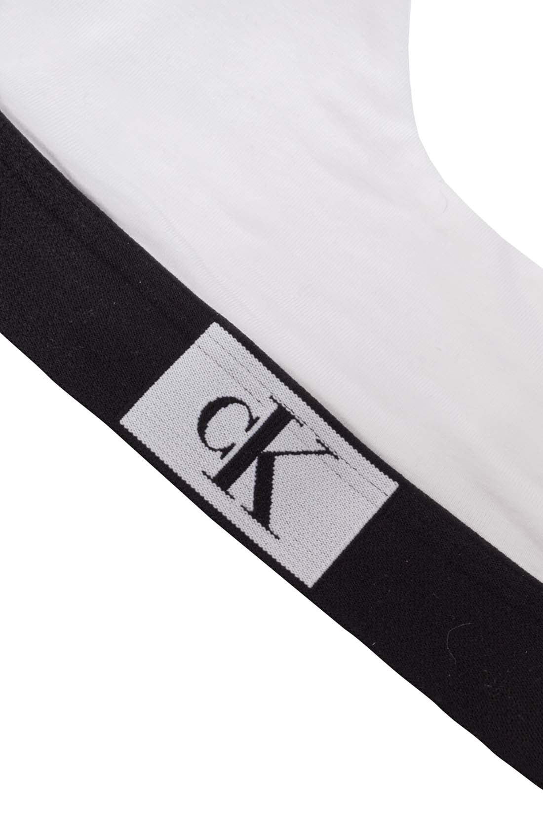 Black Calvin Klein women's cotton bralette with thin adjustable straps and iconic contrasting logo underbust band — view 9