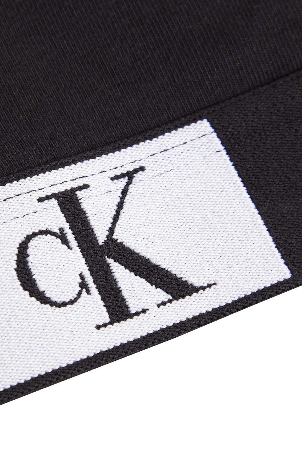 Black Calvin Klein women's cotton bralette with thin adjustable straps and iconic contrasting logo underbust band — view 30