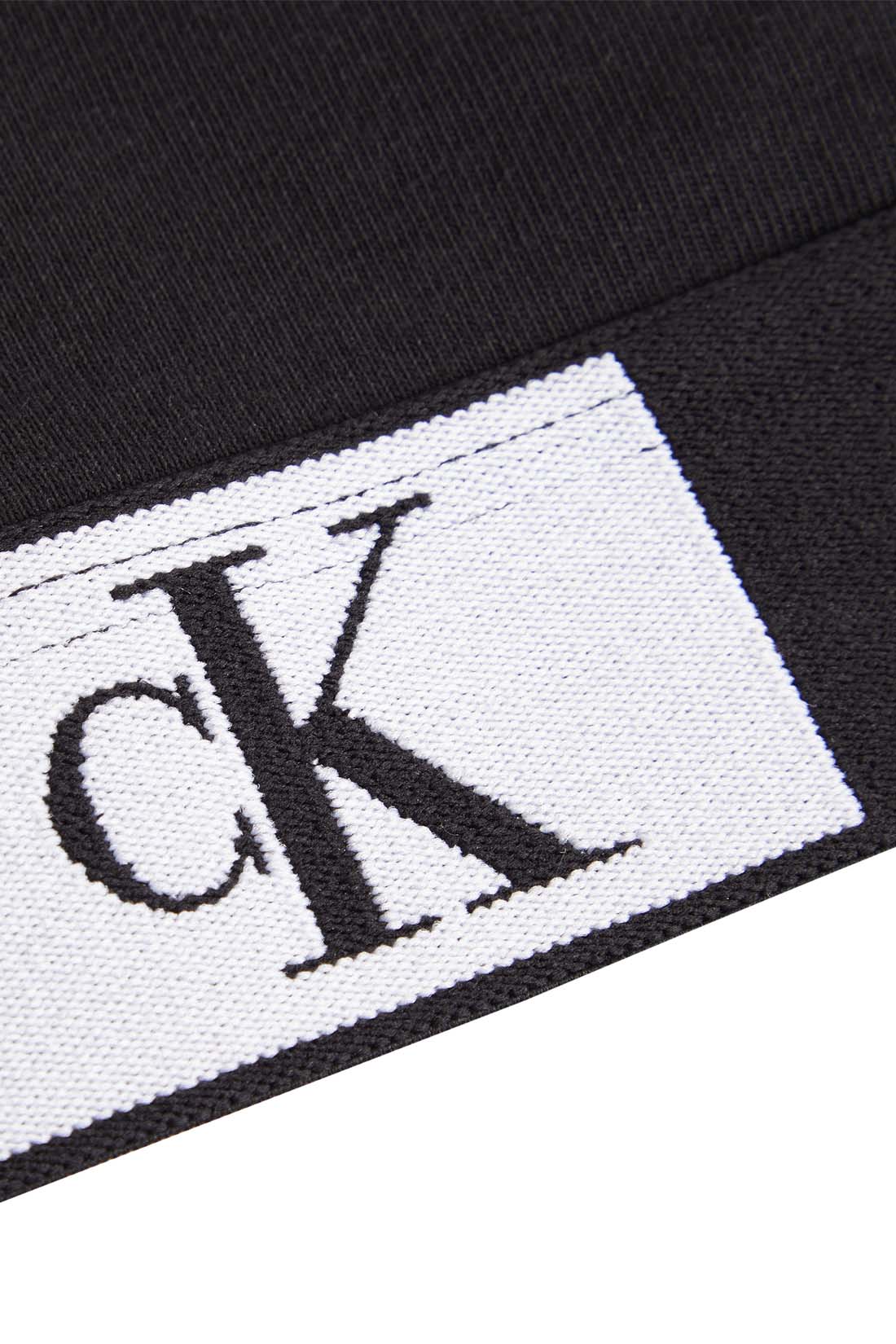 Black Calvin Klein women's cotton bralette with thin adjustable straps and iconic contrasting logo underbust band — view 30