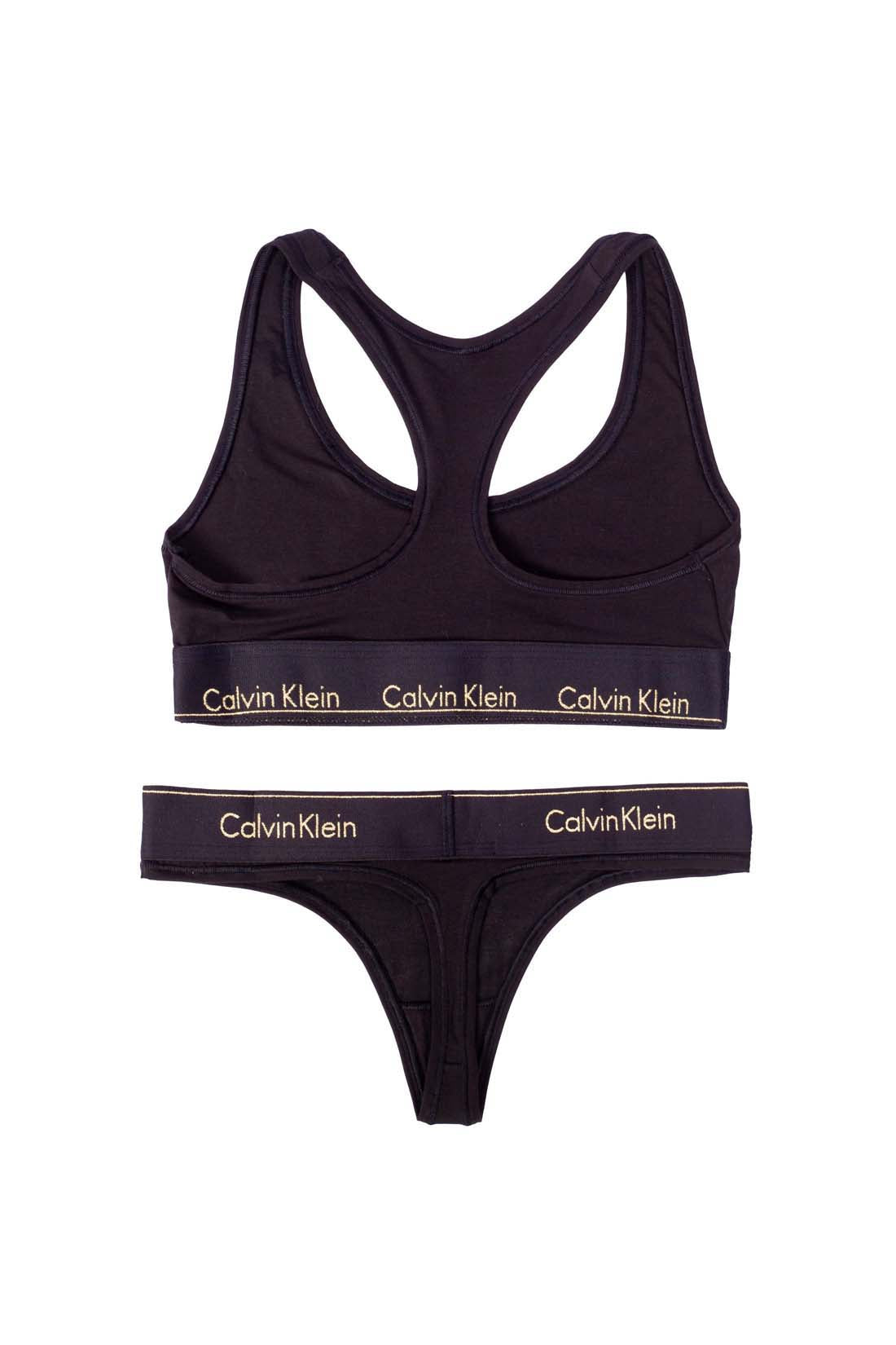Black women's bralette and thong set in stretch cotton featuring contrasting white logo elastic bands — view 7
