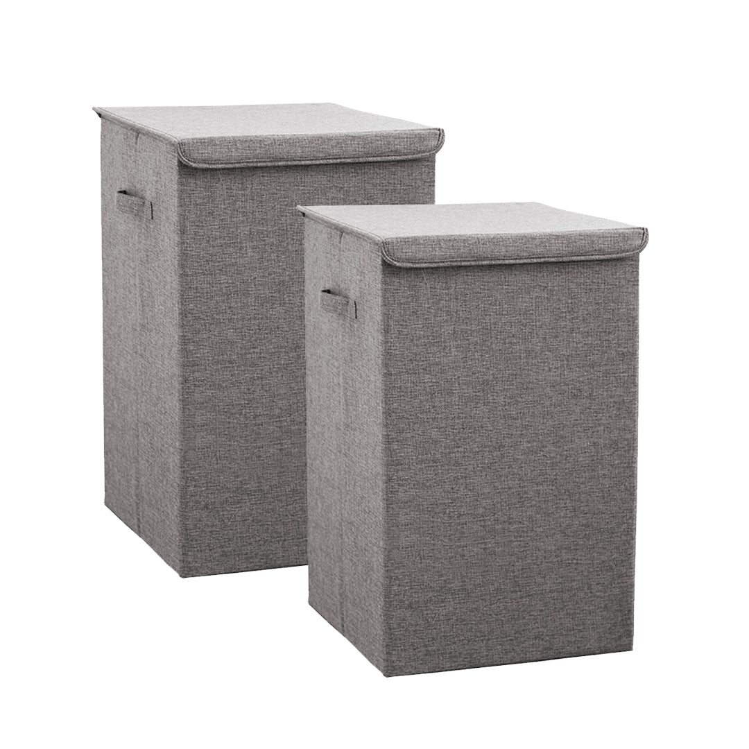 Two grey medium collapsible canvas laundry hampers with lids and carrying handles for home storage