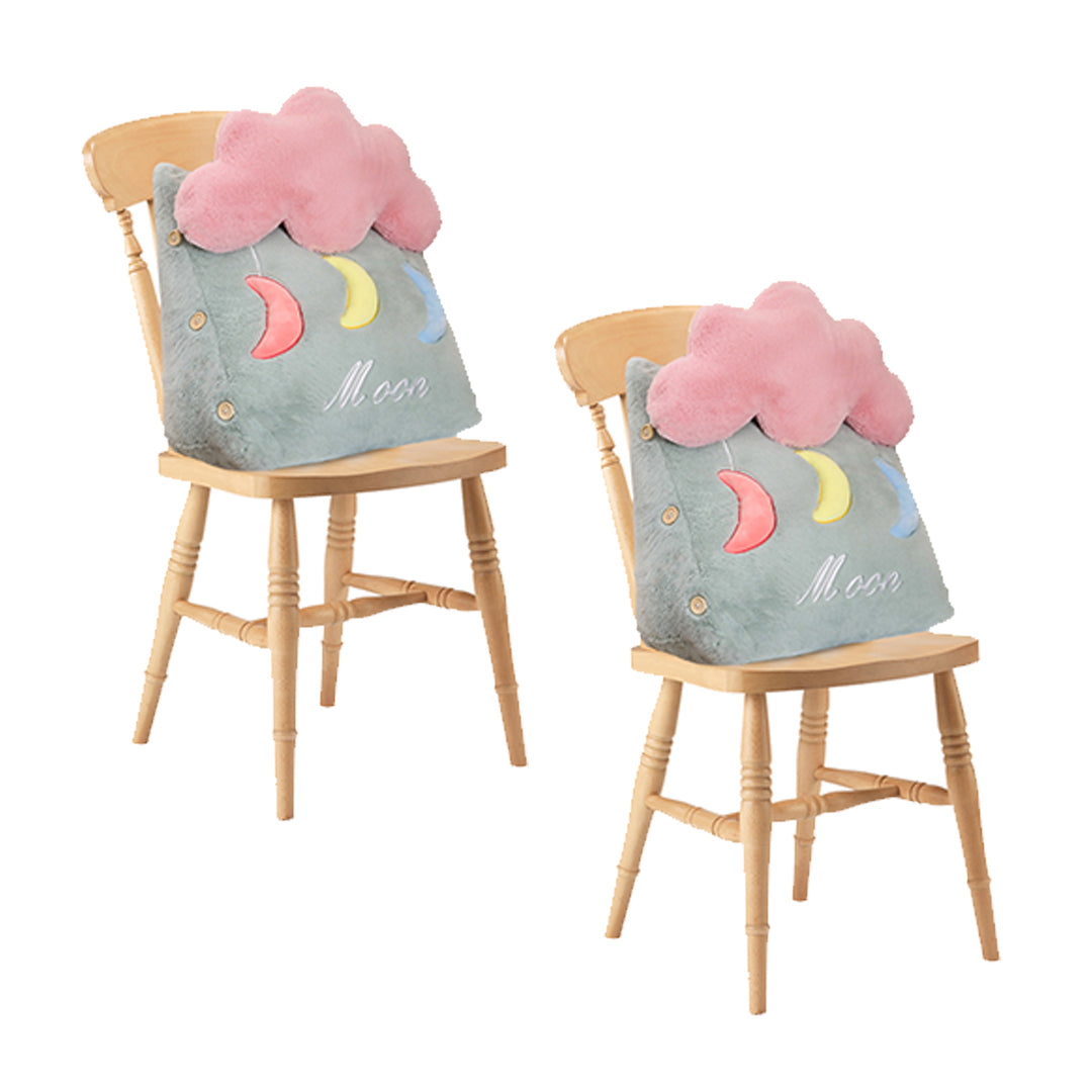 Two green cloud shaped plush wedge pillows for lumbar support on a bed or sofa