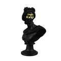 Black resin classical bust sculpture featuring a modern gold eye mask on a marble base.