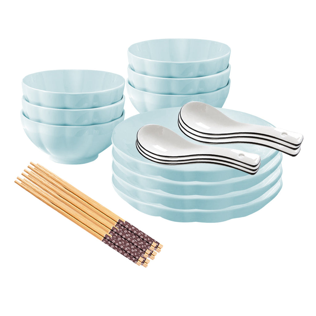 Light blue Japanese style ceramic dinnerware set including soup bowls, plates, spoons, and wooden chopsticks