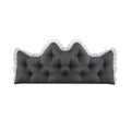 Charcoal grey tufted crown headboard cushion providing plush back support for a bed