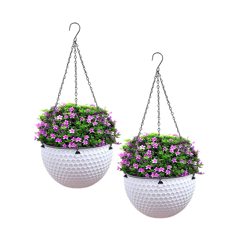 White resin hanging planters set of two, featuring metal suspension chains and built-in drainage holes.