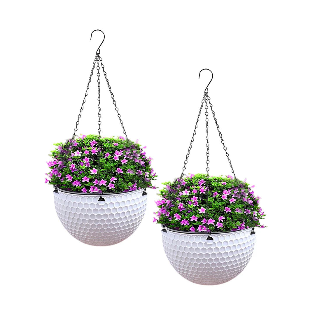 White resin hanging planters set of two, featuring metal suspension chains and built-in drainage holes.