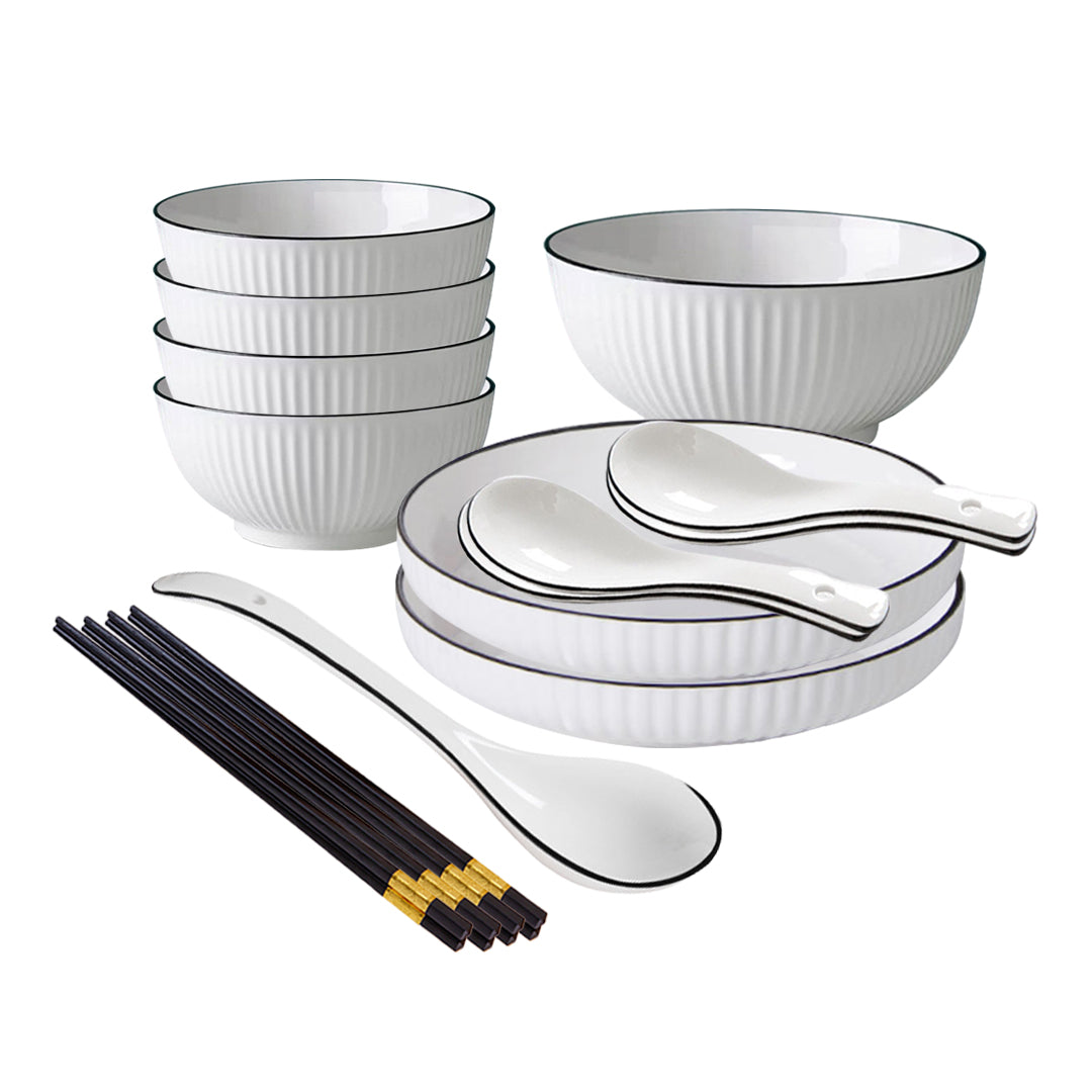 White minimalist ceramic dinnerware set including soup bowls, plates, spoons, and chopsticks