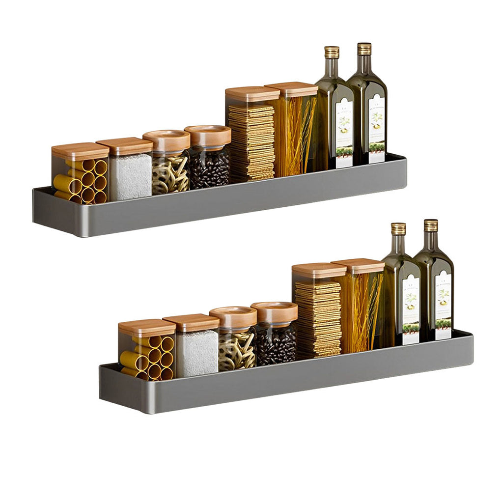 Two black aluminum wall mounted rectangular spice storage racks with installation accessories