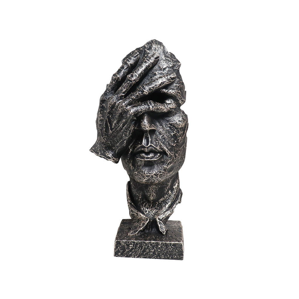 Abstract face sculpture in antique bronze black resin with a hand-over-eyes modern design.