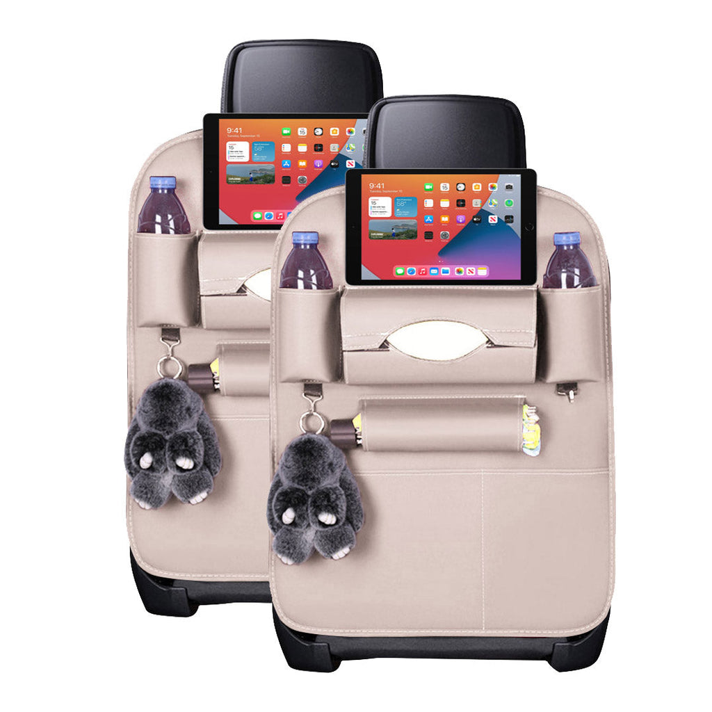 White PVC leather car backseat organizers with multiple storage pockets and tablet holders.