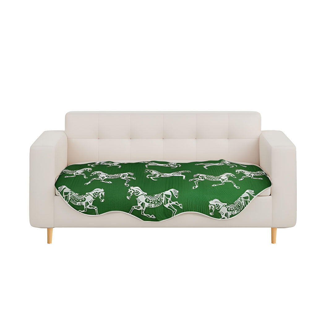 Green horse print three-seater sofa cover and polyester throw blanket draped over a modern couch.