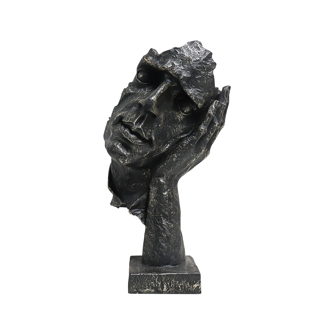 Black resin face sculpture of a thoughtful tilted head resting on a hand, antique bronze finish