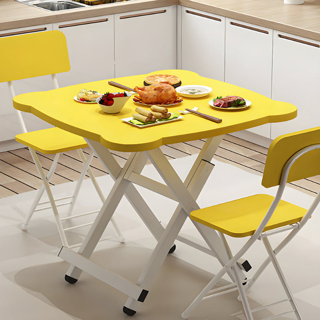 Yellow minimalist folding table with white metal legs for modern indoor and outdoor living spaces — view 2