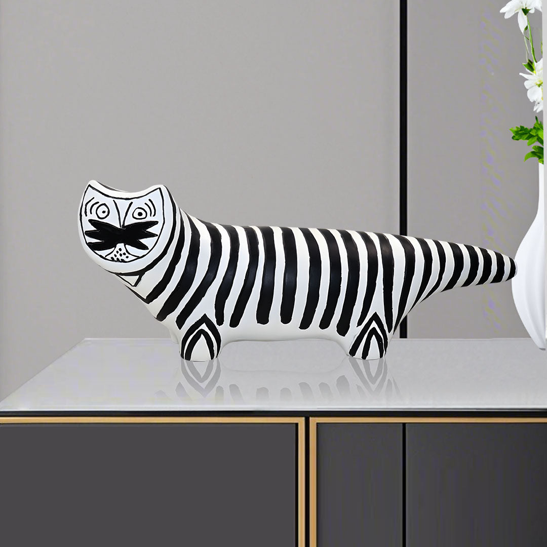 Elongated black and white striped cat resin sculpture for modern bookshelf or console table decor — view 2