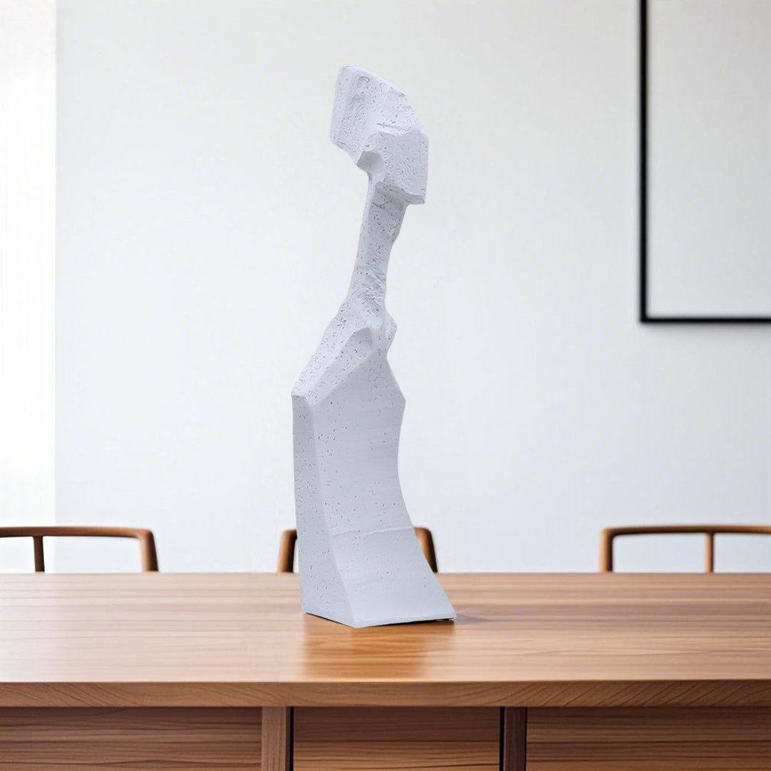 White resin abstract sculpture with modern angular design on display in a minimalist home decor setting — view 2