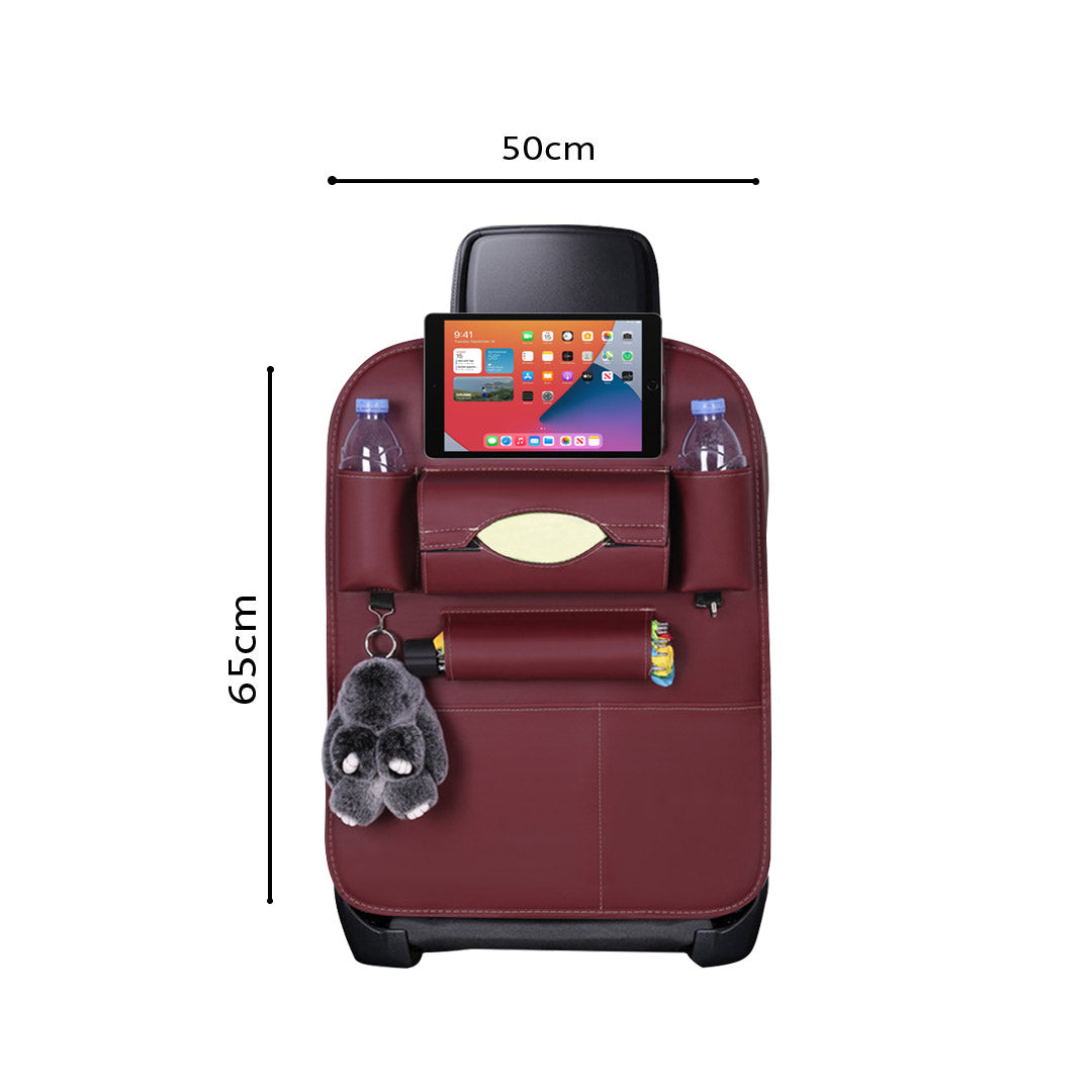 Red PVC leather multi-pocket car backseat organizer with tablet holder strapped to vehicle seat — view 2