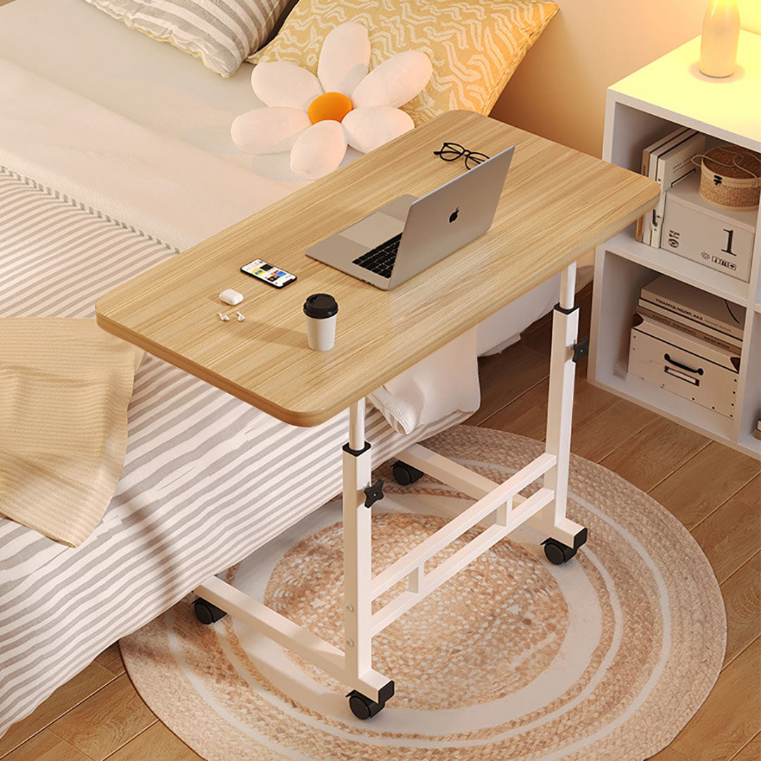 Two movable walnut wood bedside tables with white metal frames and rolling wheels. — view 2