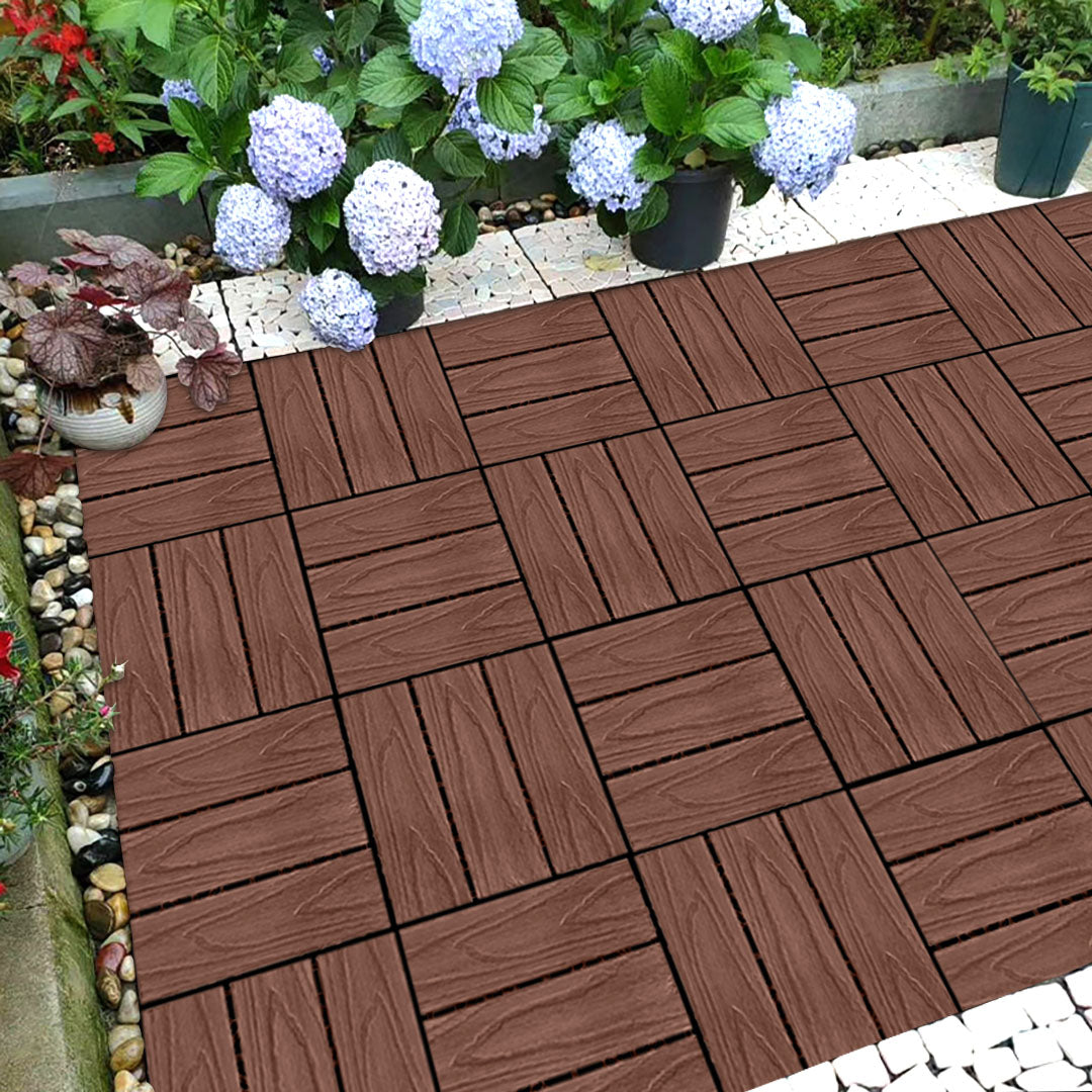 Dark chocolate wood composite interlocking decking tiles arranged for outdoor garden or patio flooring — view 2