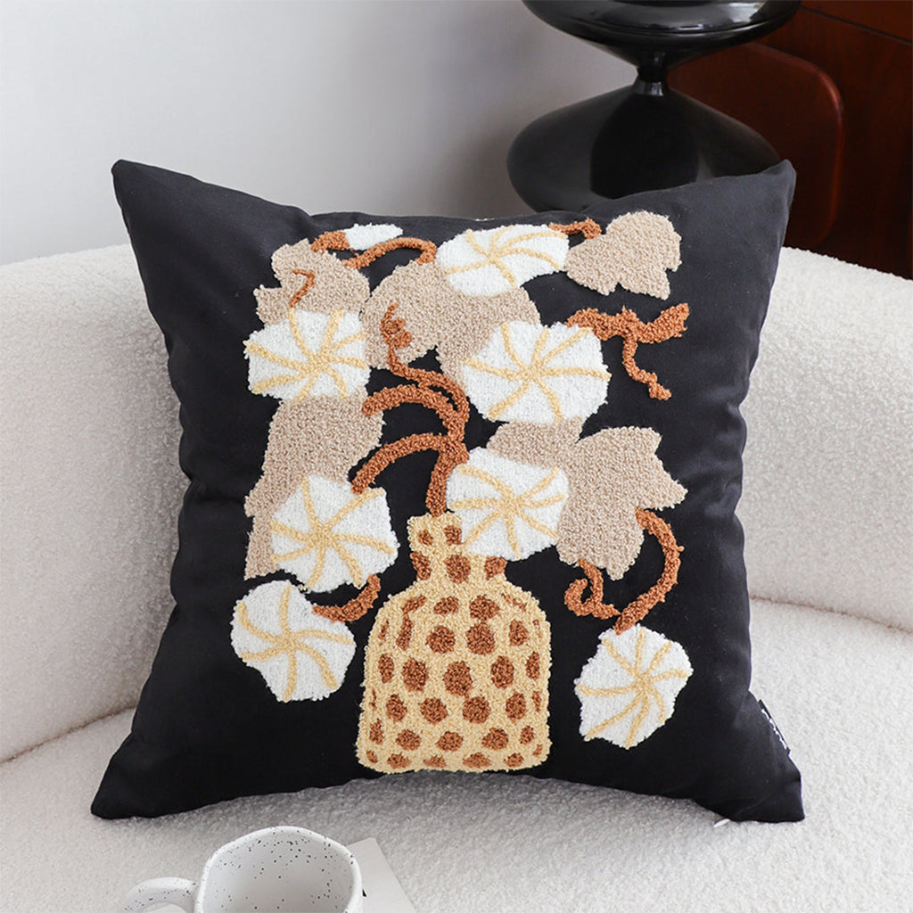 Floral embroidered throw pillow set in black and gold square design with wicker basket motif — view 2