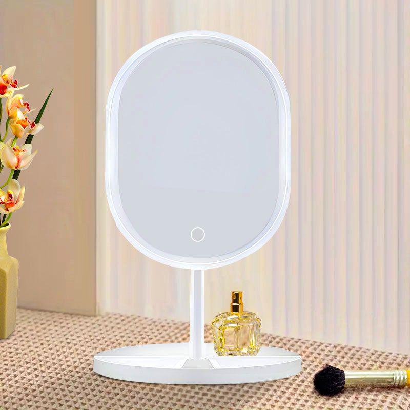 White oval LED makeup vanity mirror on a stand with bright illuminated tricolor adjustable lighting — view 2
