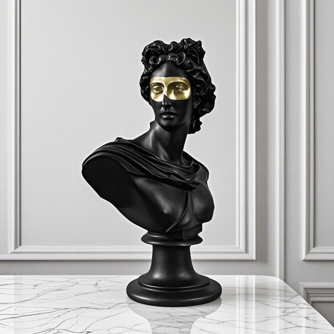 Black resin classical bust sculpture featuring a modern gold eye mask on a marble base. — view 3