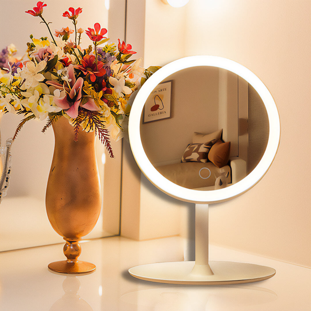 Two white round smart LED makeup vanity mirrors with adjustable tricolor lights on a bedroom table — view 3