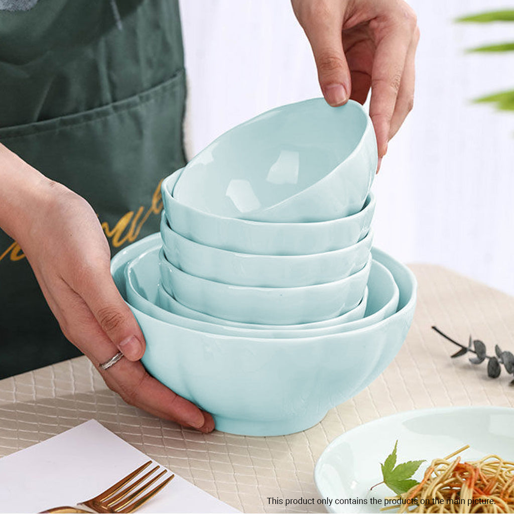 Light blue Japanese style ceramic dinnerware set including soup bowls, plates, spoons, and wooden chopsticks — view 3