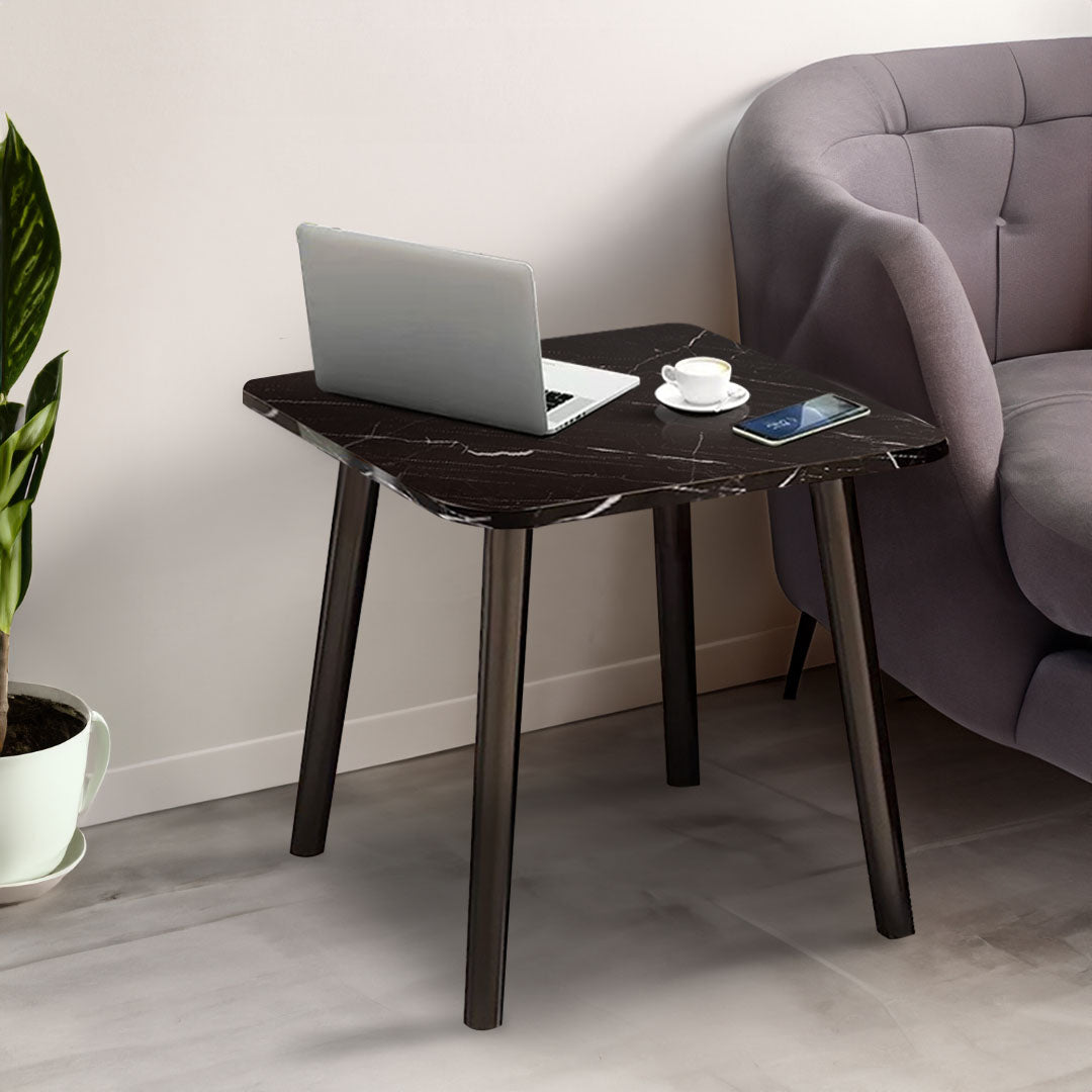 Black stone-patterned side table with sleek pine wood legs in a modern minimalist living room. — view 3