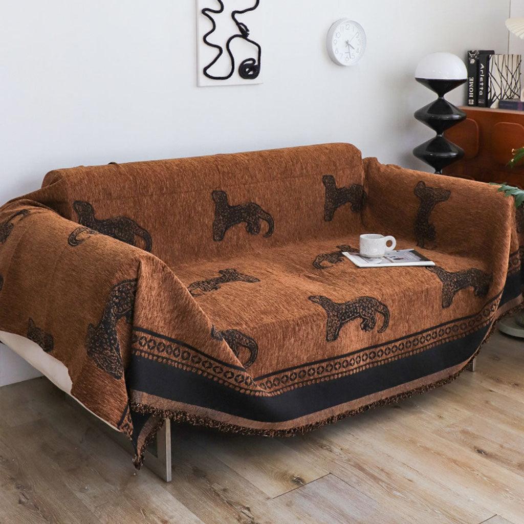 Brown leopard print two seater sofa cover made of polyester protecting a living room couch — view 3