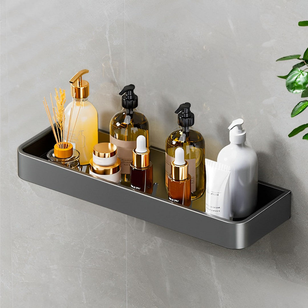 Black wall-mounted aluminum spice rack holding kitchen condiments and jars on a smooth tile wall. — view 3
