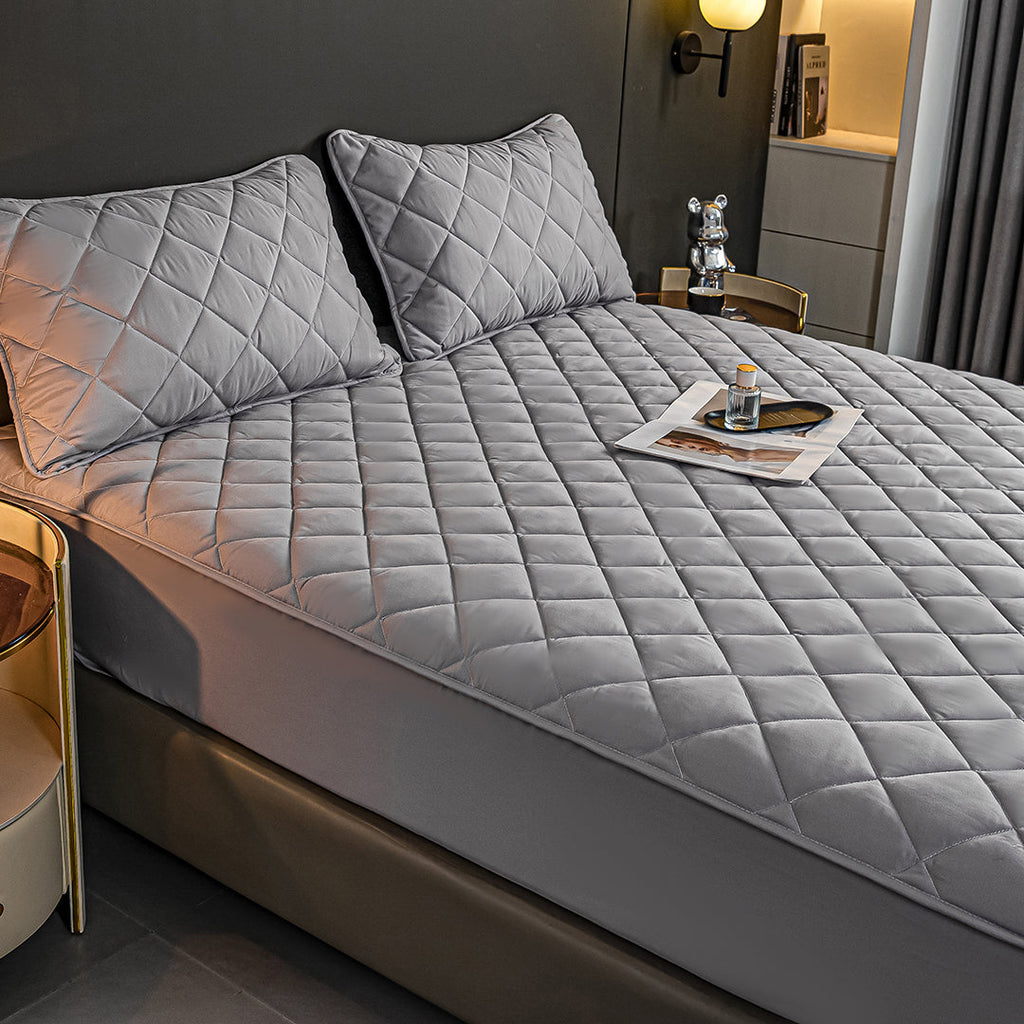 Grey cross-hatch quilted mattress cover and two matching pillow covers crafted from premium soft polyester. — view 3