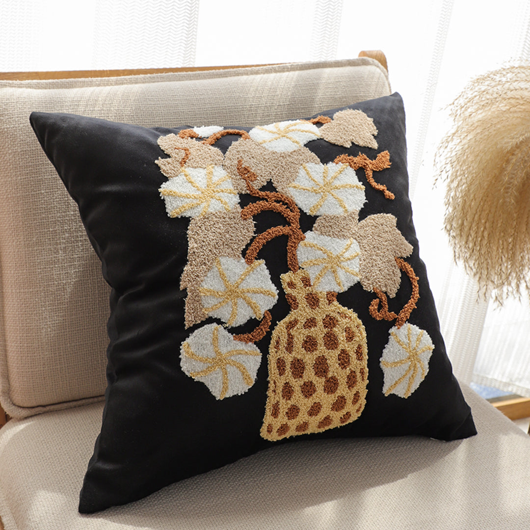 Floral embroidered throw pillow set in black and gold square design with wicker basket motif — view 3