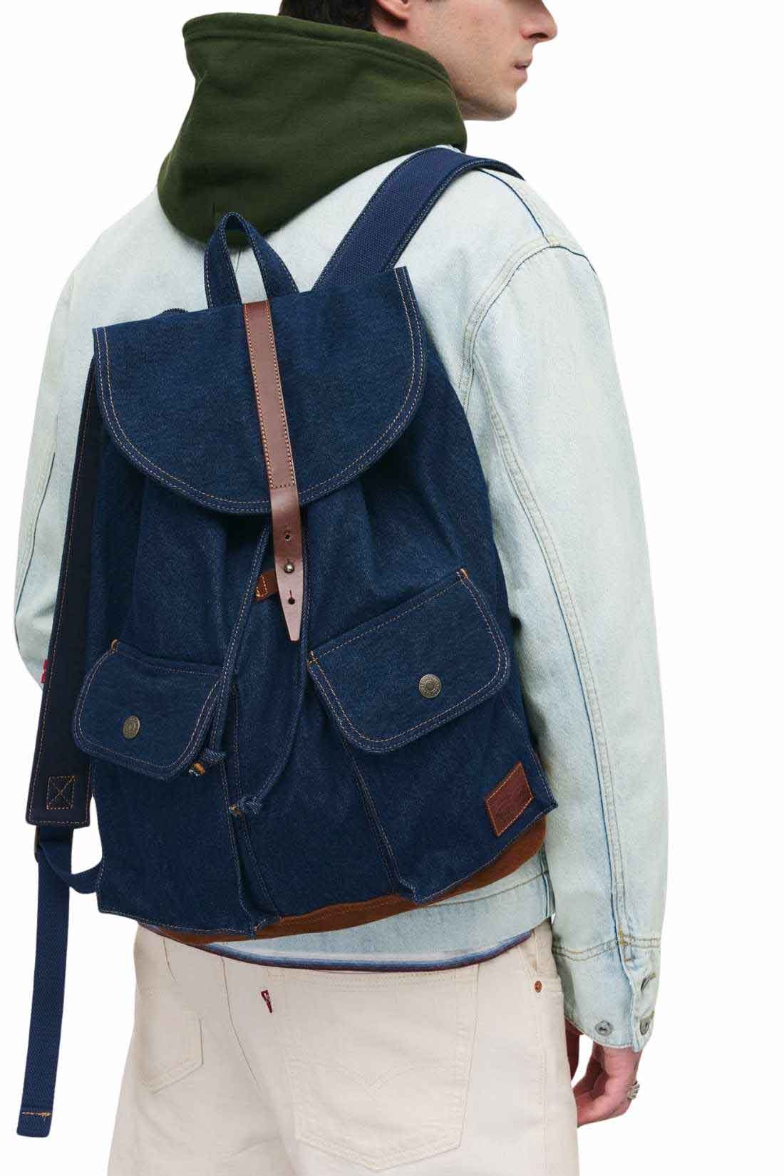 Men's Levi's denim heritage backpack with brown leather details and adjustable shoulder straps — view 2