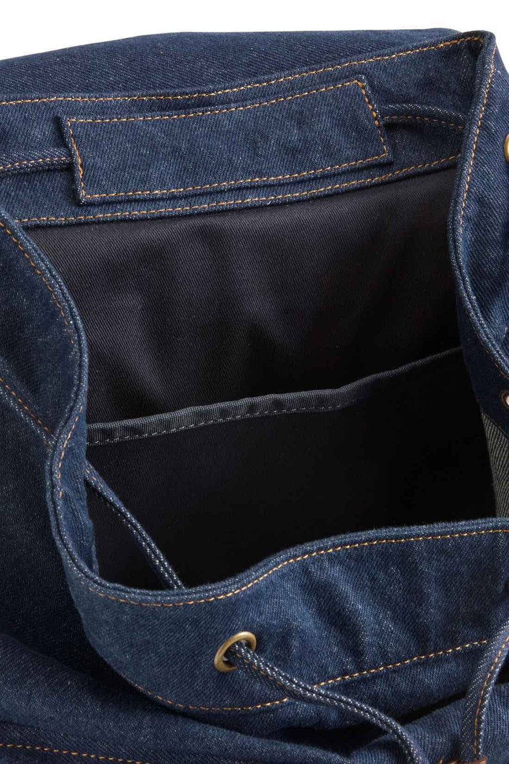 Men's Levi's denim heritage backpack with brown leather details and adjustable shoulder straps — view 10