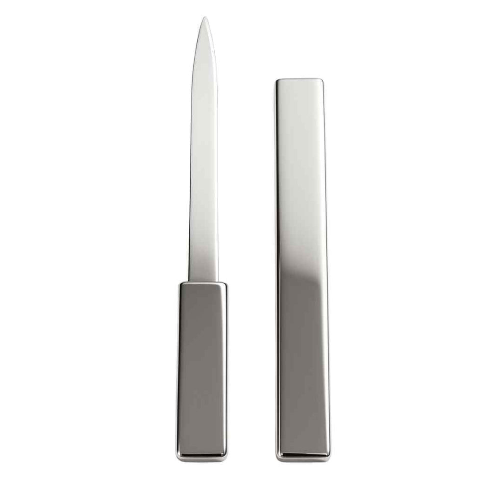 Premium nickel-plated covered letter opener resting elegantly on a modern office desk setup.