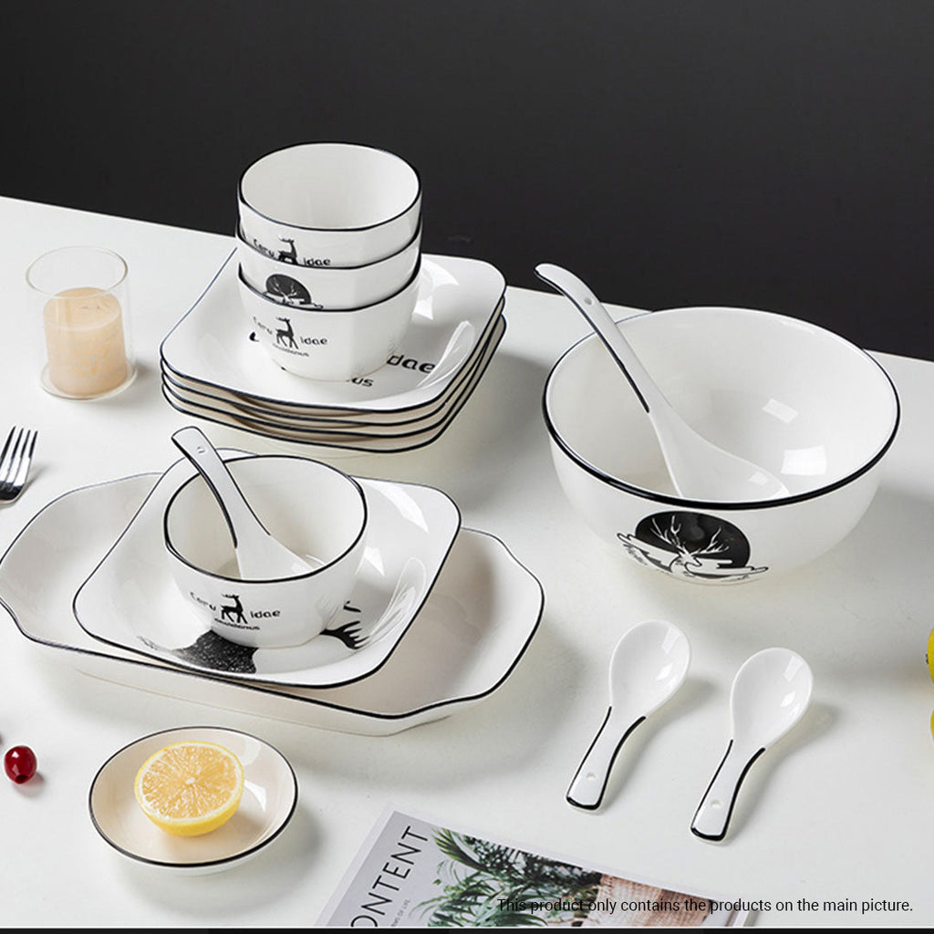 White antler ceramic dinnerware set with bowls, plates, spoons, and chopsticks on a dining table — view 4