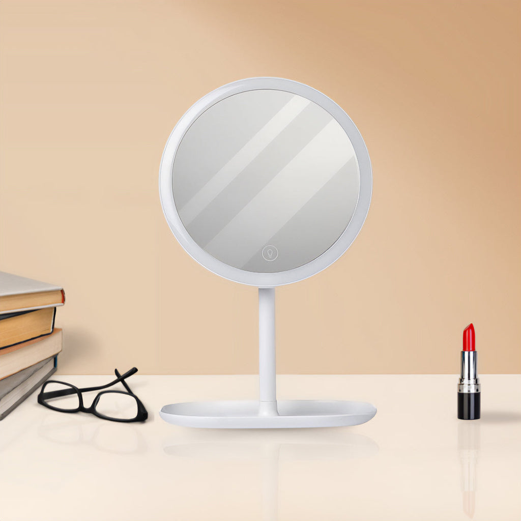 Two white round smart LED makeup vanity mirrors with adjustable tricolor lights on a bedroom table — view 4