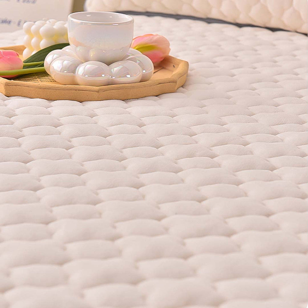 Beige quilted fleece mattress cover protector with clover design and two matching pillowcases — view 4