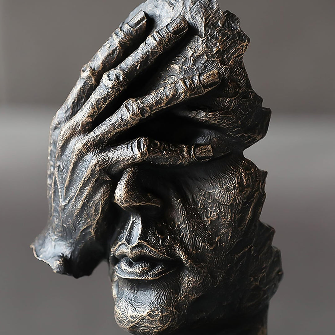 Abstract face sculpture in antique bronze black resin with a hand-over-eyes modern design. — view 4