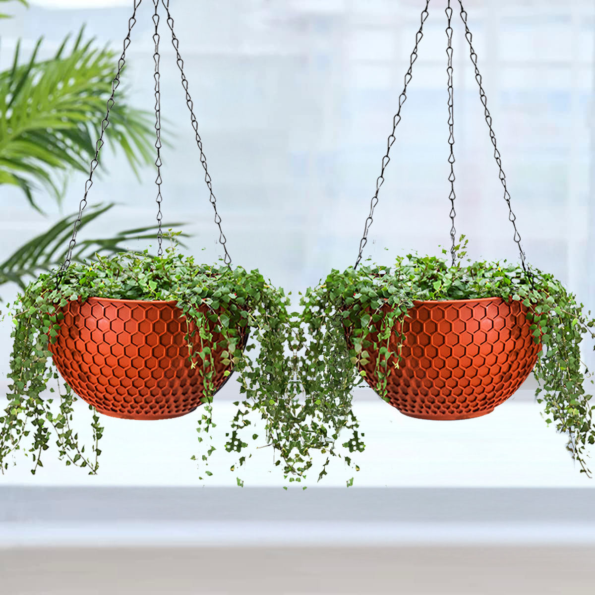 Two vibrant red large hanging resin plant pots with suspension chains and hooks — view 4