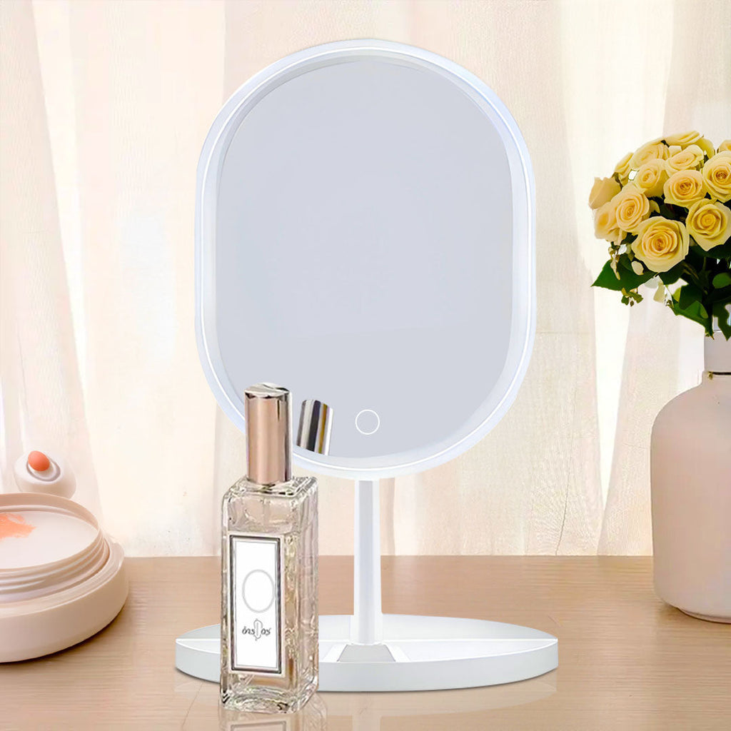 White oval LED makeup vanity mirror on a stand with bright illuminated tricolor adjustable lighting — view 4