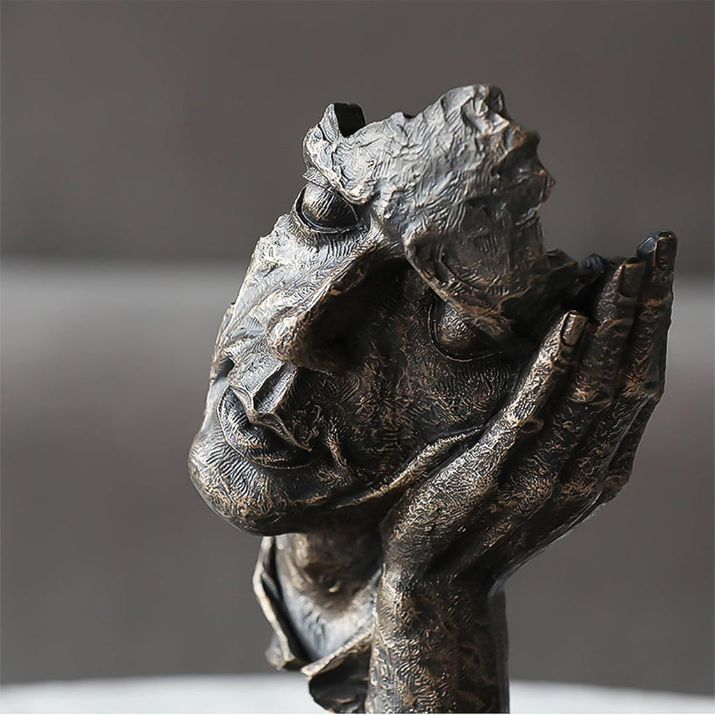 Black resin face sculpture of a thoughtful tilted head resting on a hand, antique bronze finish — view 4