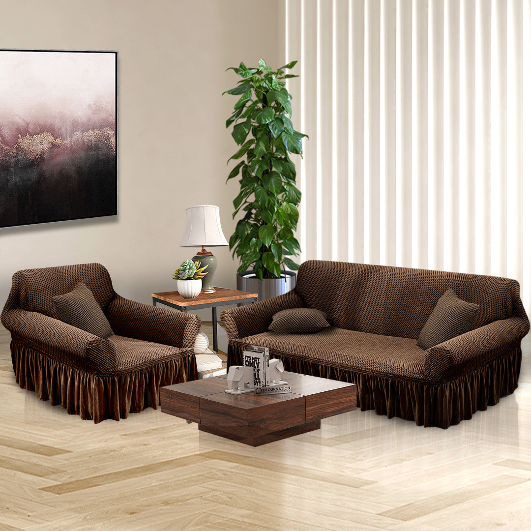 Coffee brown 1-seater sofa cover with ruffled skirt draped over an armchair in a living room. — view 4