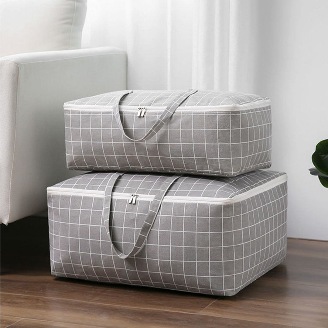 Two large grey plaid foldable travel storage bags with reinforced double handles and zipper closures — view 4