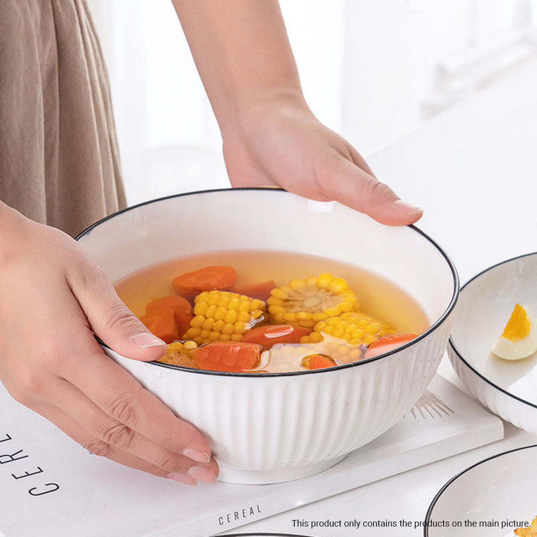 White minimalist ceramic dinnerware set including soup bowls, plates, spoons, and chopsticks — view 3