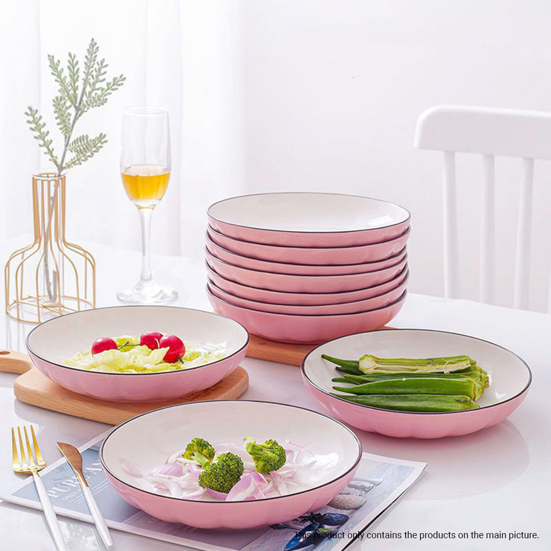 Pink Japanese ceramic dinnerware set featuring stackable plates, soup bowls, matching spoons, and chopsticks — view 4