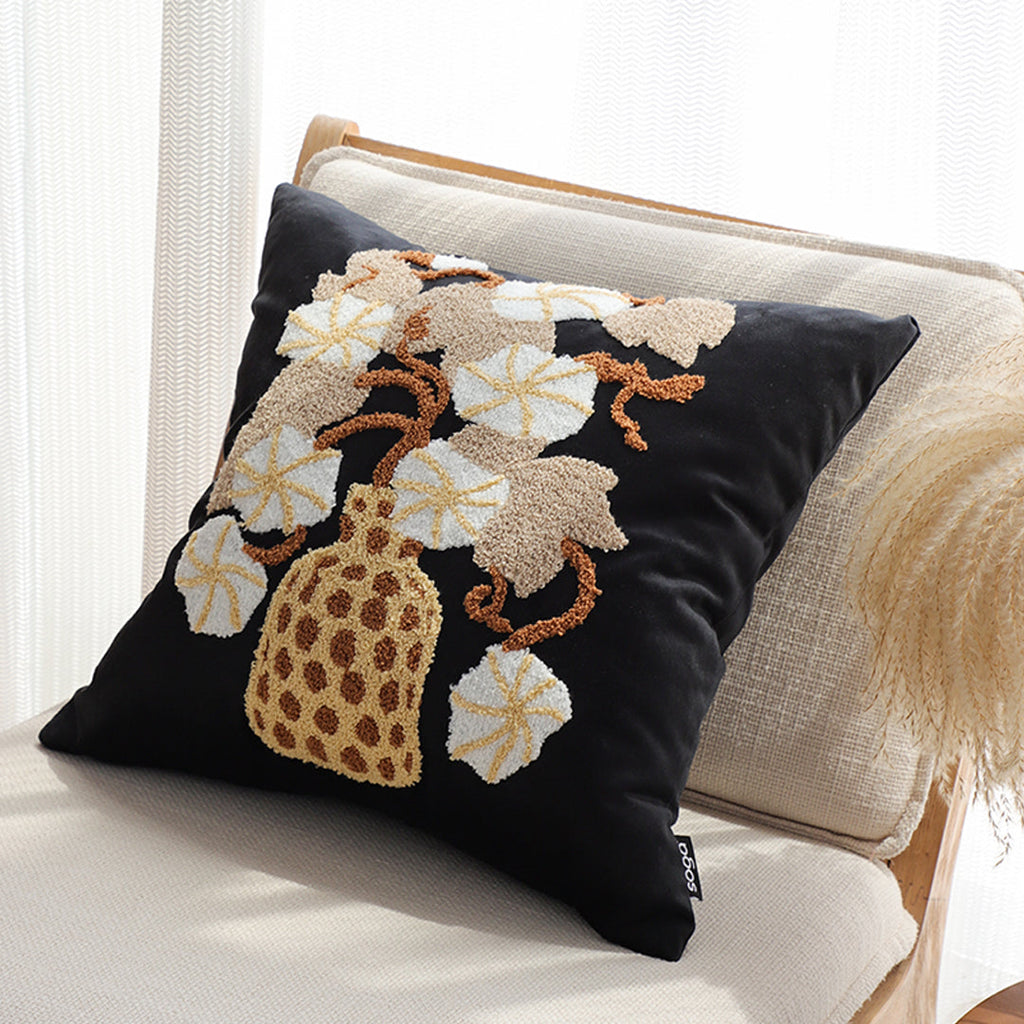 Floral embroidered throw pillow set in black and gold square design with wicker basket motif — view 4